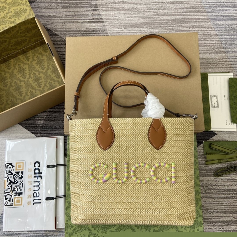 G*u*i shopping bags